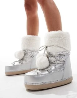 Public Desire Aster Snowboots With With Fur Trim And Pom Pom Detail In Silver For Women